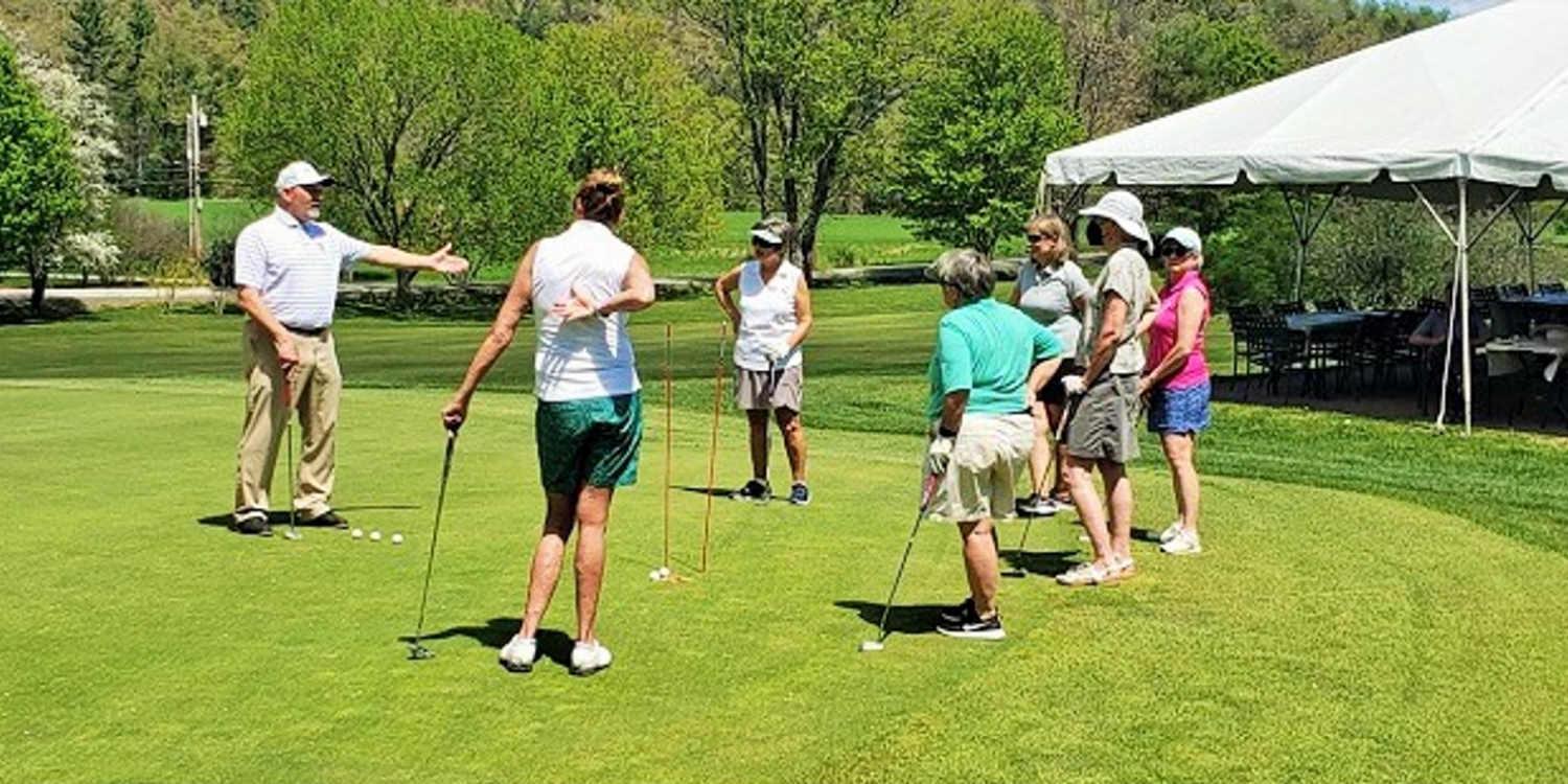 Brattleboro Country Club Director of Golf Mike Zaranek leads a putting clinic.
