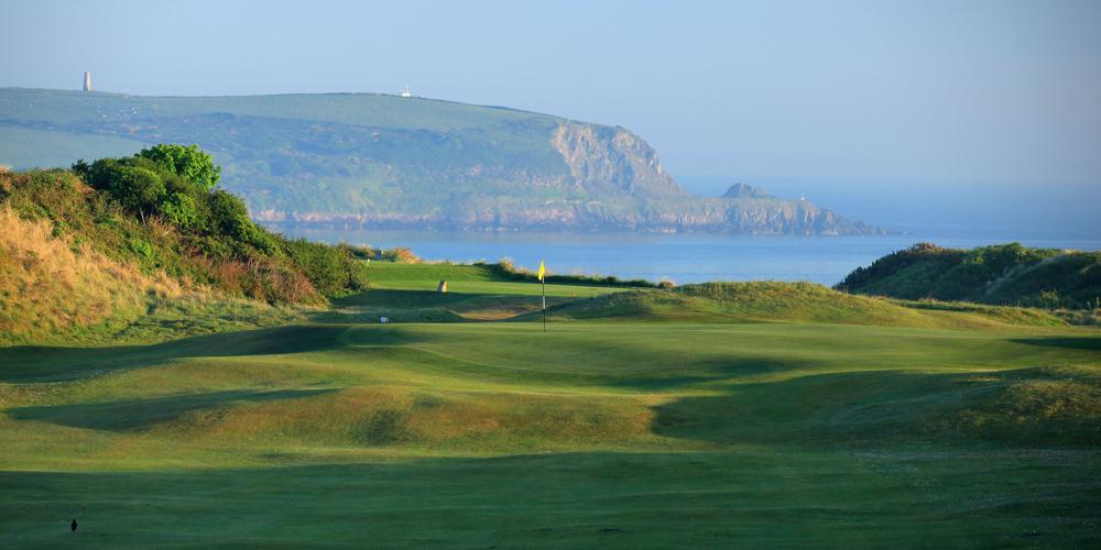 St Enodoc - the Camel Estuary forms a backdrop to the 1st hole