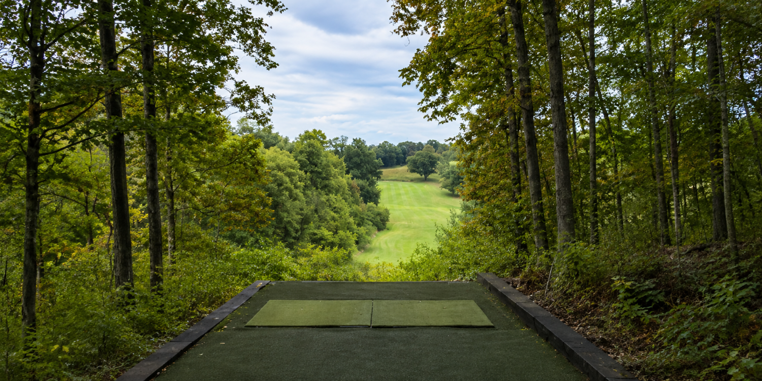 Teeing off from mats through the woods on Hole 7 is certainly a unique feature of Gustin.