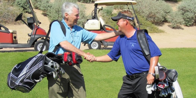 Antigua President Ron McPherson (left) with PGA Pro Ken Carpenter